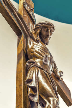 A wood carved statue  of the Crucifixion of Jesus Christの写真素材