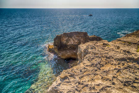 rocks and coves of the coast of Salento of the Ionian Sea in Italy,  near Tricase, Lecce, Apuliaの写真素材