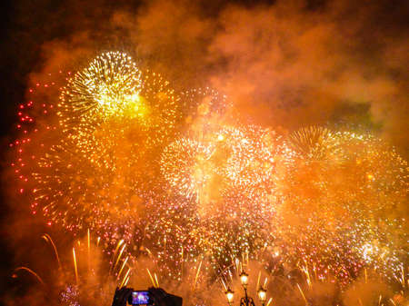 fireworks photographed by a mobile phoneの写真素材