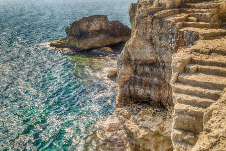 rocks and coves of the coast of Salento of the Ionian Sea in Italy,  near Tricase, Lecce, Apuliaの写真素材