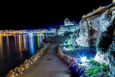 Night view of harbor of Otranto, Greek-Messapian city on the Adriatic Sea in Italyの写真素材
