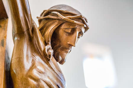 Celebrating the Good Friday, the face of Jesus Christ with crown of thorns dead on the crossの写真素材