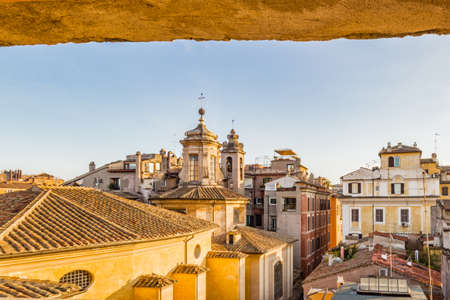 overlooking the rooftops of Rome, historic palaces, Catholic churches and old housesのeditorial素材
