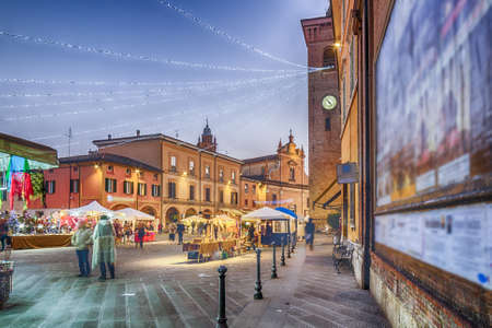 Ancient palaces and Christmas decorations in the streets of a medieval village in the countryside of...