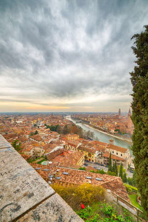 panorama of the Adige River as it passes through the houses and historical buildings of Verona in...