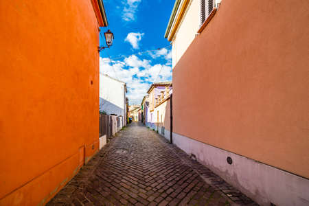 the colorful houses of the streets of the village of fishermen in riminiの写真素材