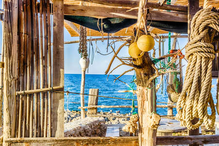 fishing hut on the coast of Puglia in Italyの写真素材