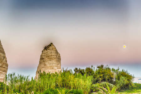 typical rocky cliffs in Vieste Gargano in Puglia, Italyの写真素材
