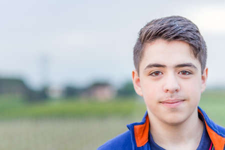 close up of young boy in countrysideの写真素材