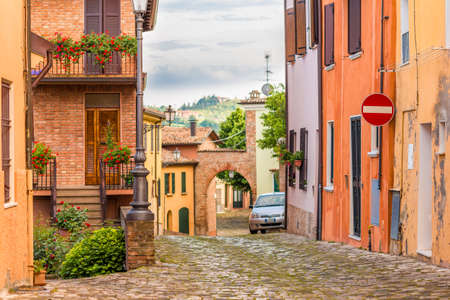 cobbled street of a medieval village on the hills of Romagna in Italyの写真素材