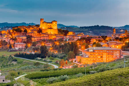 Night view of castle and roofs of houses in the tranquility of a medieval village in the hills of Romagna in Italyのeditorial素材