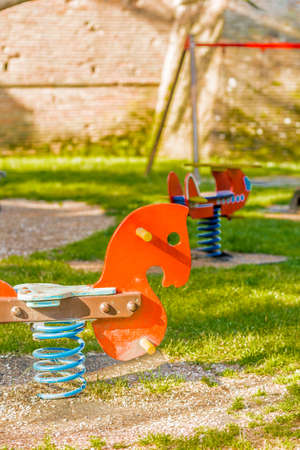 spring horses on a playgroundの写真素材