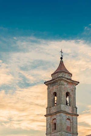 ancient church tower in the medieval village in Italyの写真素材