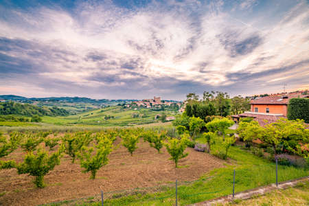 panorama of cultivated fields on the hills of Emilia Romagna dominated by Malatestian Castle,  medieval fortress dating back to 1200 AD, of Longiano, Italyのeditorial素材