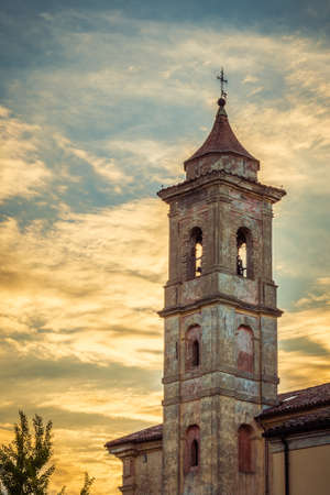 ancient church tower in the medieval village in Italyの写真素材