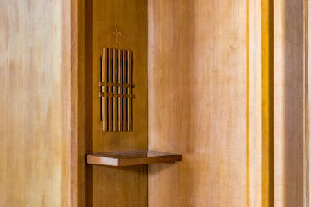wooden confessional in a Christian churchの写真素材