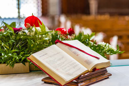 Gospel book open on the altar