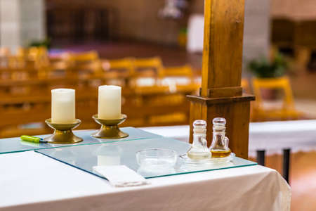 bottles of water and wine on the altar for the celebration of Holy Massの写真素材