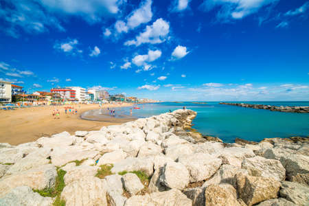 Panorama of the Adriatic Riviera in Romagna, Italy, with beaches, sea, umbrellas and hotelsの写真素材