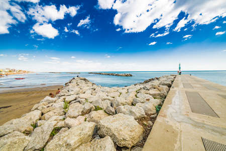 Panorama of the Adriatic Riviera in Romagna, Italy, with beaches, sea, umbrellas and hotelsの写真素材