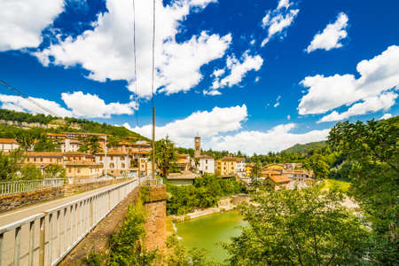 the old houses of a mountain village overlooking the river