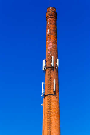 old brick chimney as cell towersの写真素材