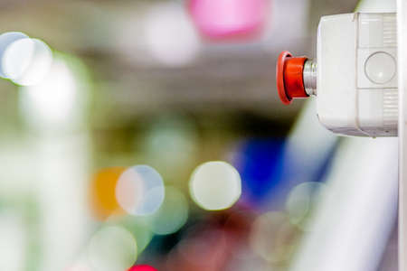 emergency red button for the immediate stop of a machineの写真素材