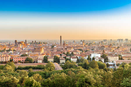 Aerial panoramic cityscape of Bologna, Italy,  above rooftops of  typical houses, ancient buildings and medieval towersの写真素材