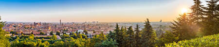 Aerial panoramic cityscape of Bologna, Italy,  above rooftops of  typical houses, ancient buildings...