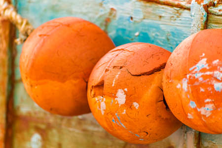 cracks in orange buoyancy aidsの写真素材
