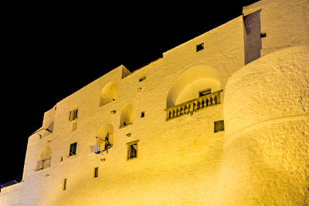 night view of ancient buildings in Ostuni, The White Cityの写真素材