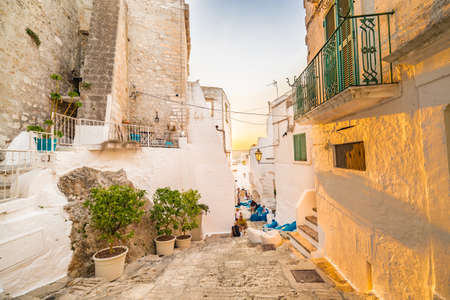 The Middle Eastern atmosphere of an alleyway in Ostuni, The White Cityの写真素材