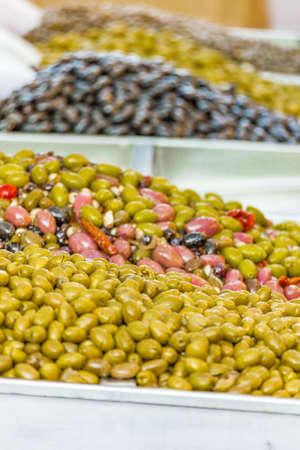 stall of Sicilian seasoned olivesの写真素材