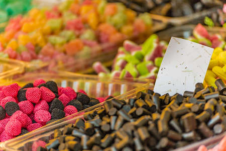 Background of colourful candy jellies in stall marketの写真素材