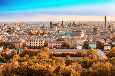 Aerial panoramic cityscape of Bologna, Italy,  above rooftops of  typical houses, ancient buildings and medieval towersの写真素材