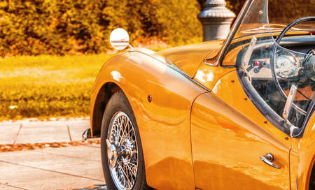 view from behind of the sinuous line of the bodywork of vintage sports carの写真素材