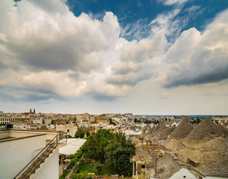 conical roofs of the trulli of Alberobello in Puglia, Italyの写真素材