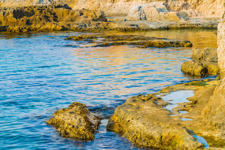 rocky coastal shore of Pugliaの写真素材