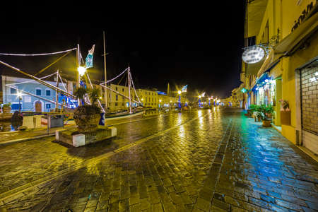 Christmas Lights on floating boats, in Italyの写真素材