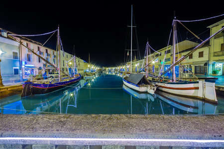 Christmas Lights on floating boats, in Italyの写真素材