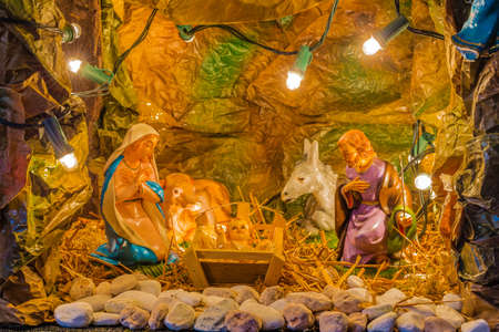 Christmas nativity scene of Holy Baby Jesus in the manger with Blessed Virgin Mary and  Saint Josephの写真素材