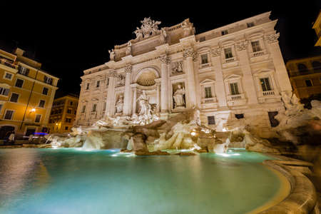 ancient Roman Fountain at night in Rome, Italyの写真素材