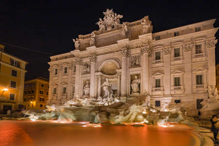 ancient Roman Fountain at night in Rome, Italyの写真素材