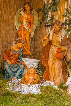 Christmas nativity scene of Holy Baby Jesus with Blessed Virgin Mary and  Saint Joseph and an Angelの写真素材