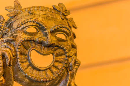 statue of theatrical mask at nightの写真素材