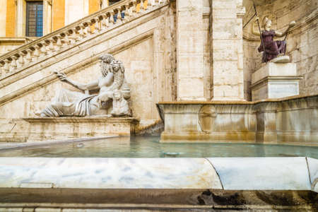 Ancient fountain in Rome, Italyの写真素材