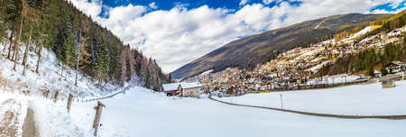 Panoramic view of winter mountain landscape with Italian villageの写真素材