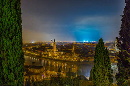 skyline of Verona city in Italy at nightの写真素材