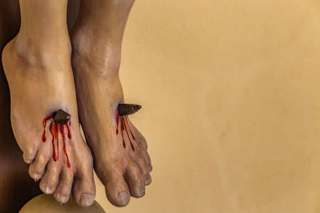 nailed feet, detail of sculpture of the Crucifixion of Jesus Christの写真素材