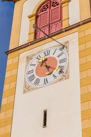 clock of the bell tower of a Catholic church